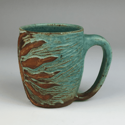 Carved Sun Mug