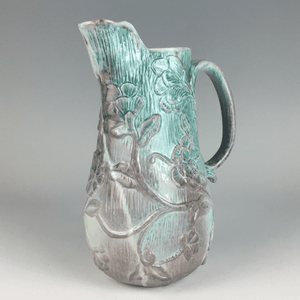 Hand Carved Pitcher